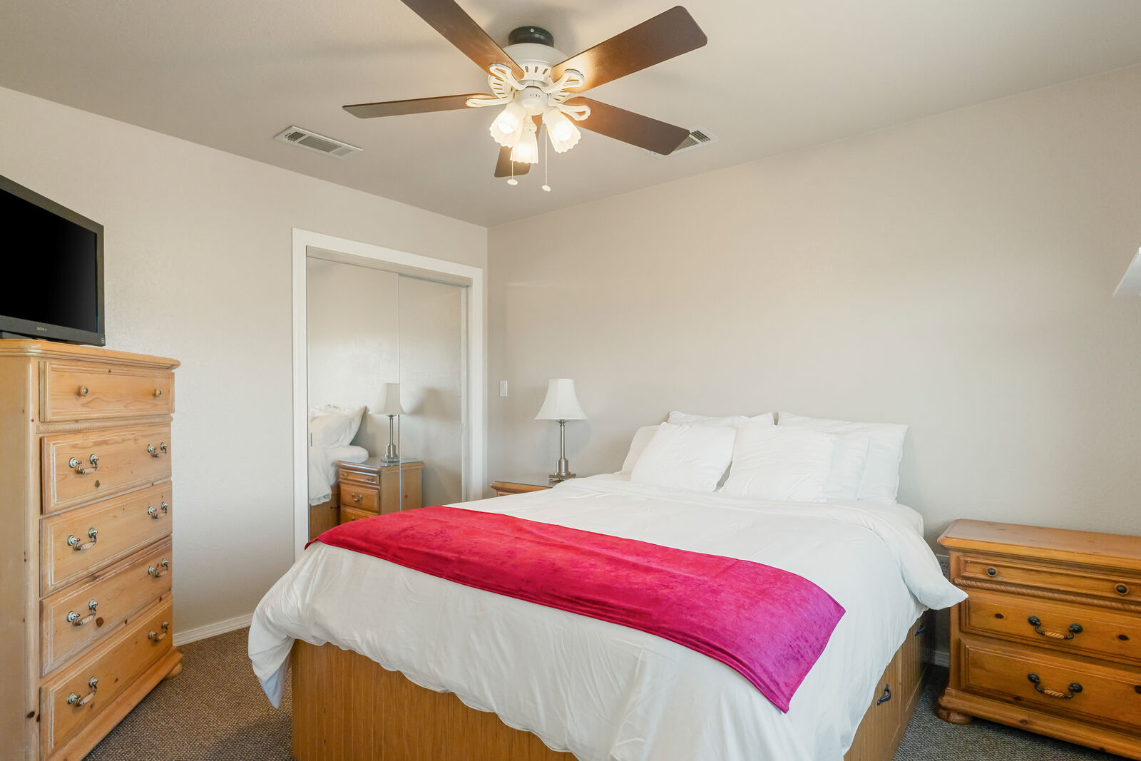 Throat Chakra bedroom — queen bed