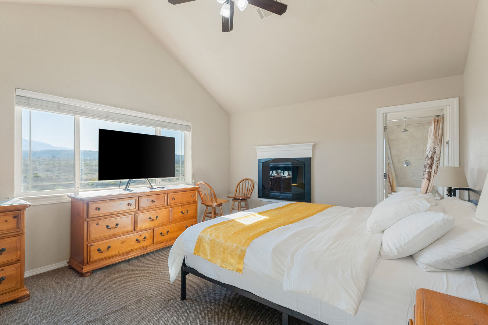 Crown Chakra master suite — king bed, fireplace, Mt. Shasta view