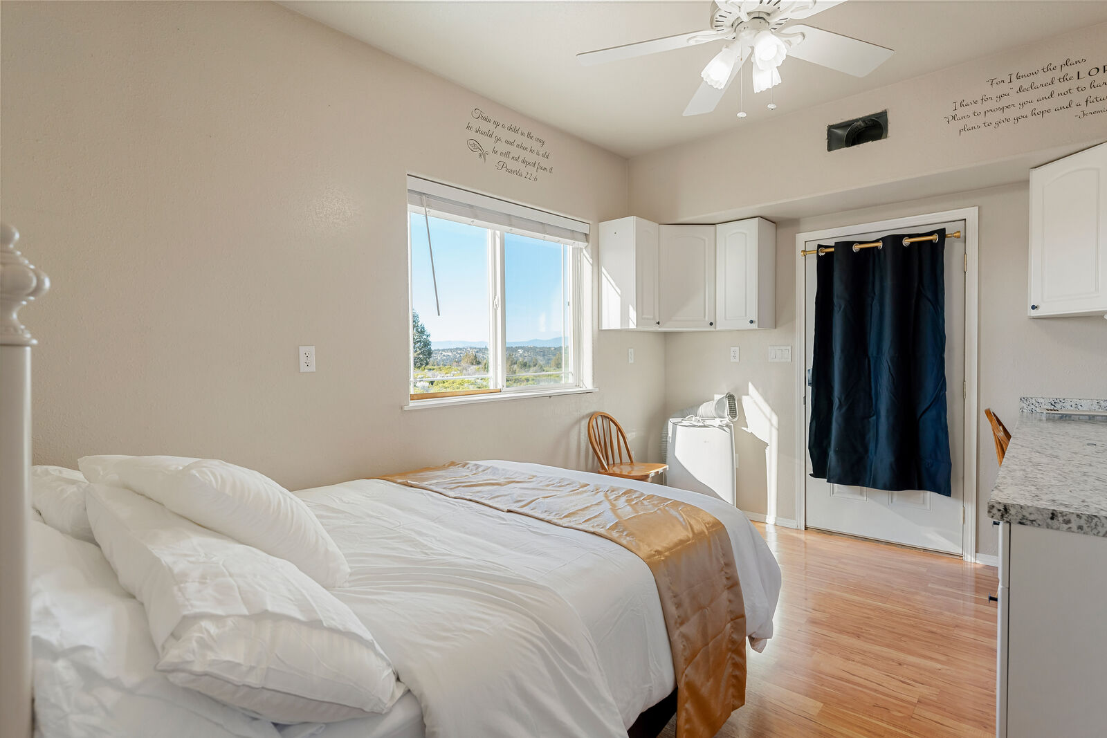 1st floor bedroom — queen bed, mountain views