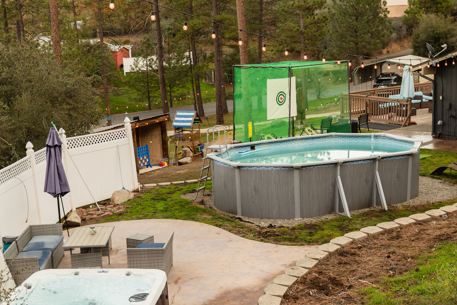Pool and hot tub overview with mini golf