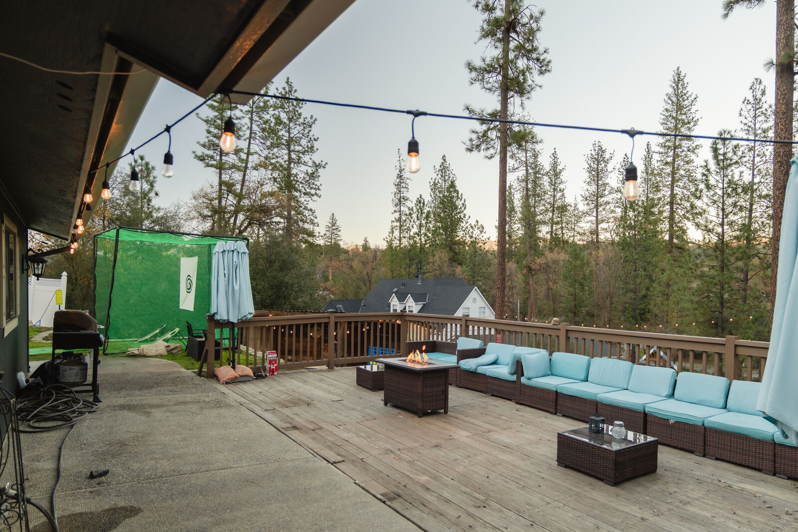 Deck with sectional sofa and fire pit