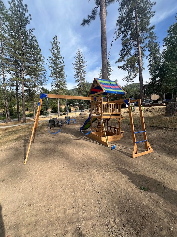 Kids play structure and swings