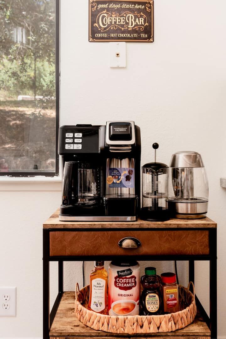 Coffee bar with Keurig and supplies