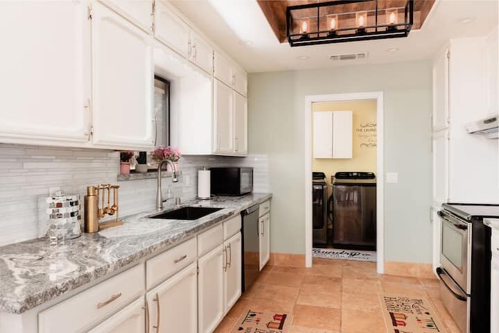 Kitchen House 1 — white cabinets, marble counters